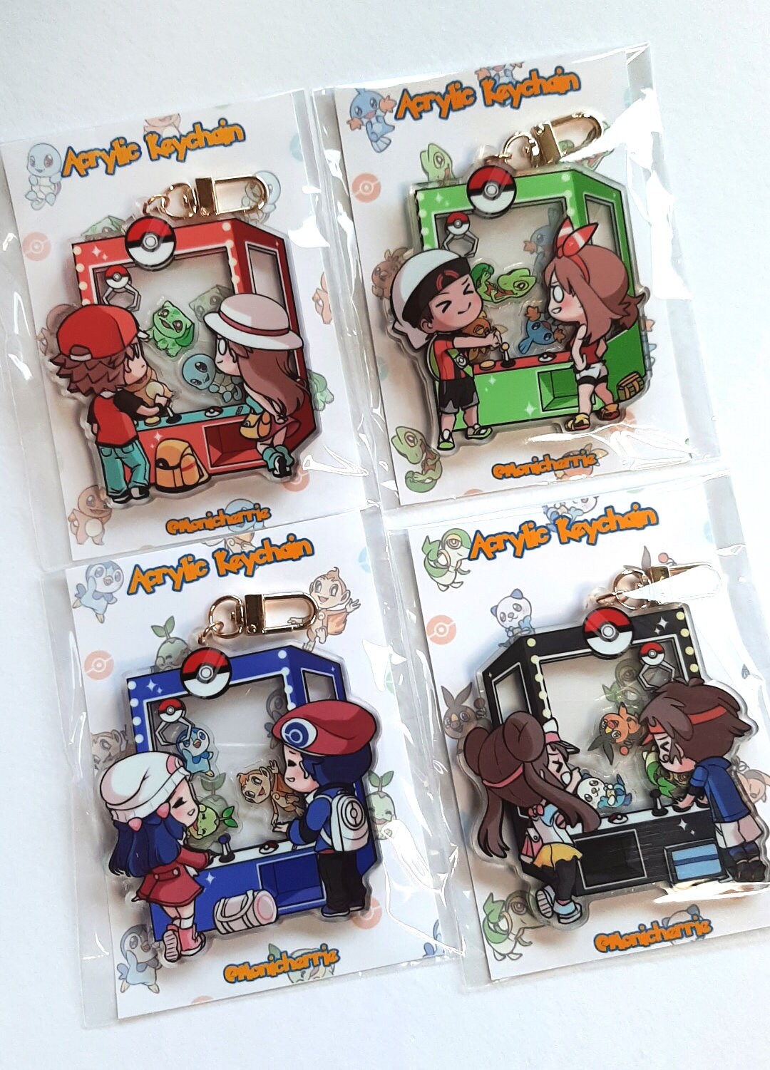 Poke Claw Machine Shaker Acrylic Keychains